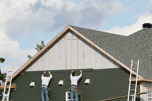 Professional Siding technician working in Marion, NC